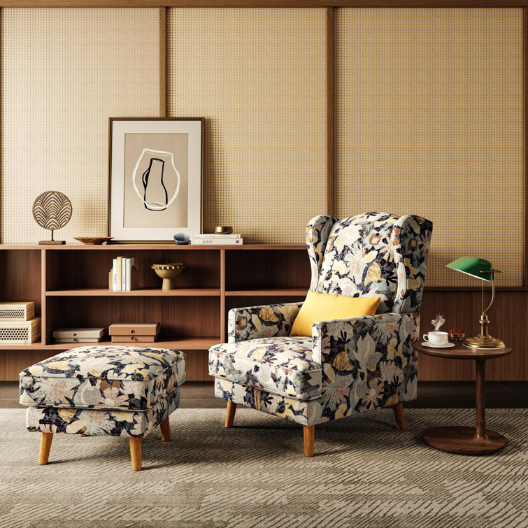 Upholstered armchair with online ottoman